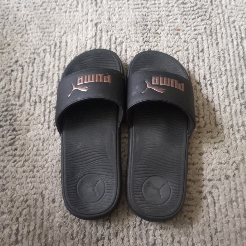 Puma Black Slides with Gold Logo